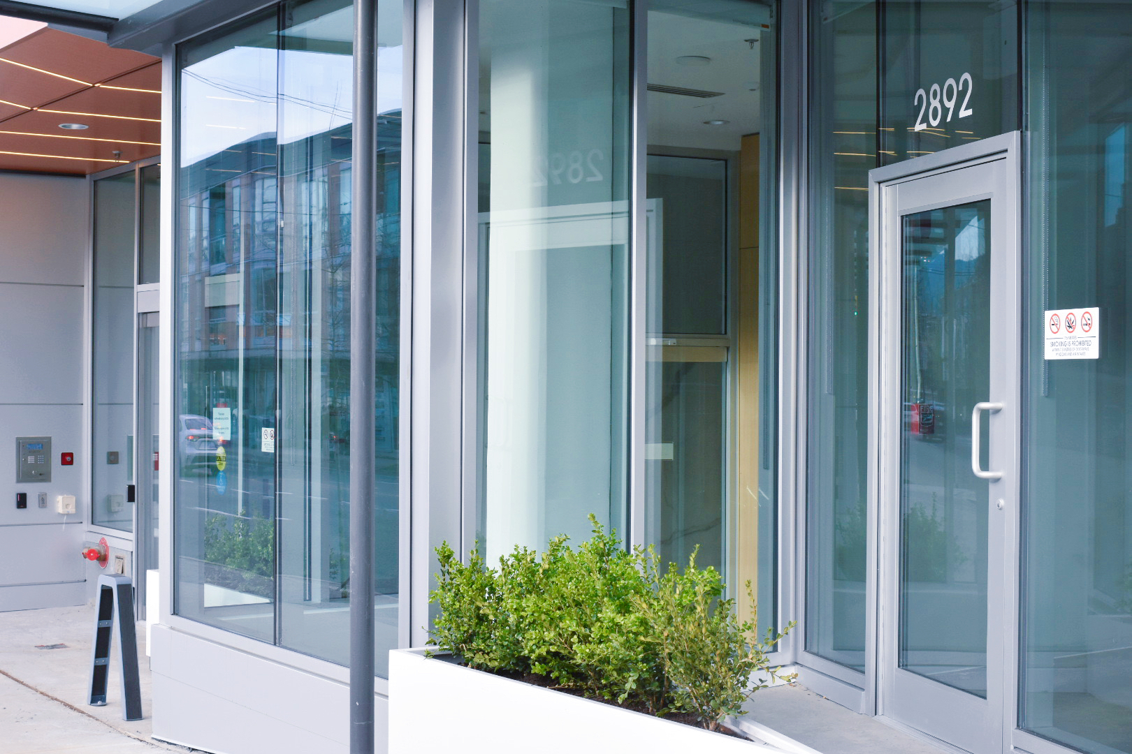 The Arbutus glass canopy and entrance storefront system