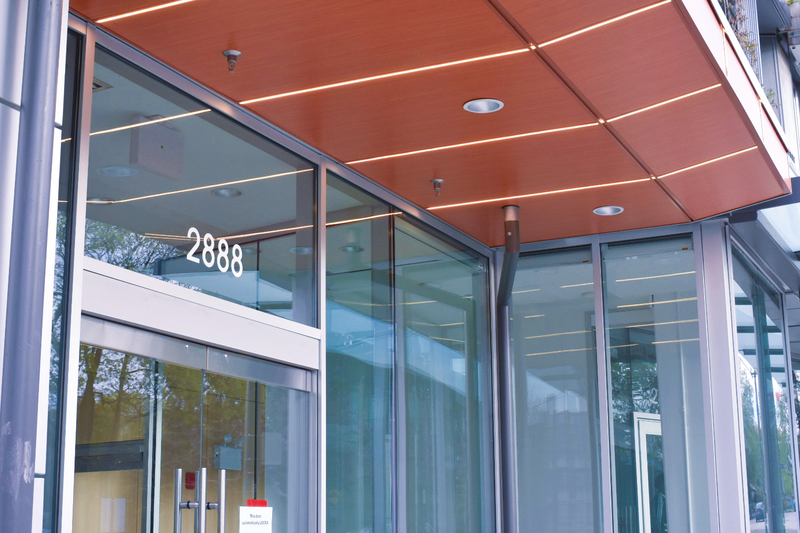 The Arbutus entrance custom metal flashing and framing